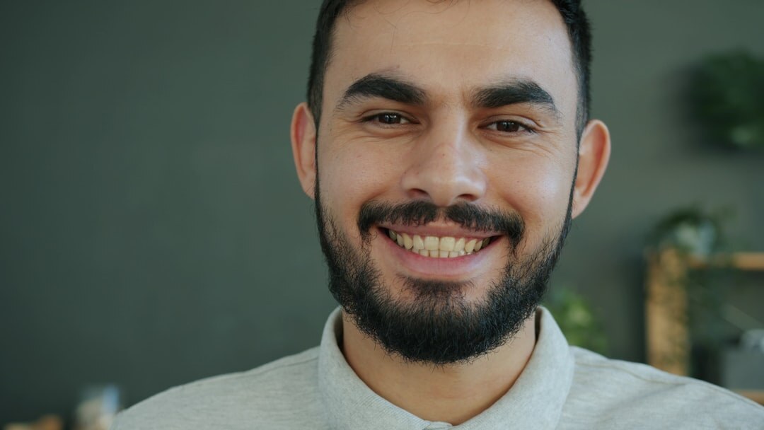person smiling confidently