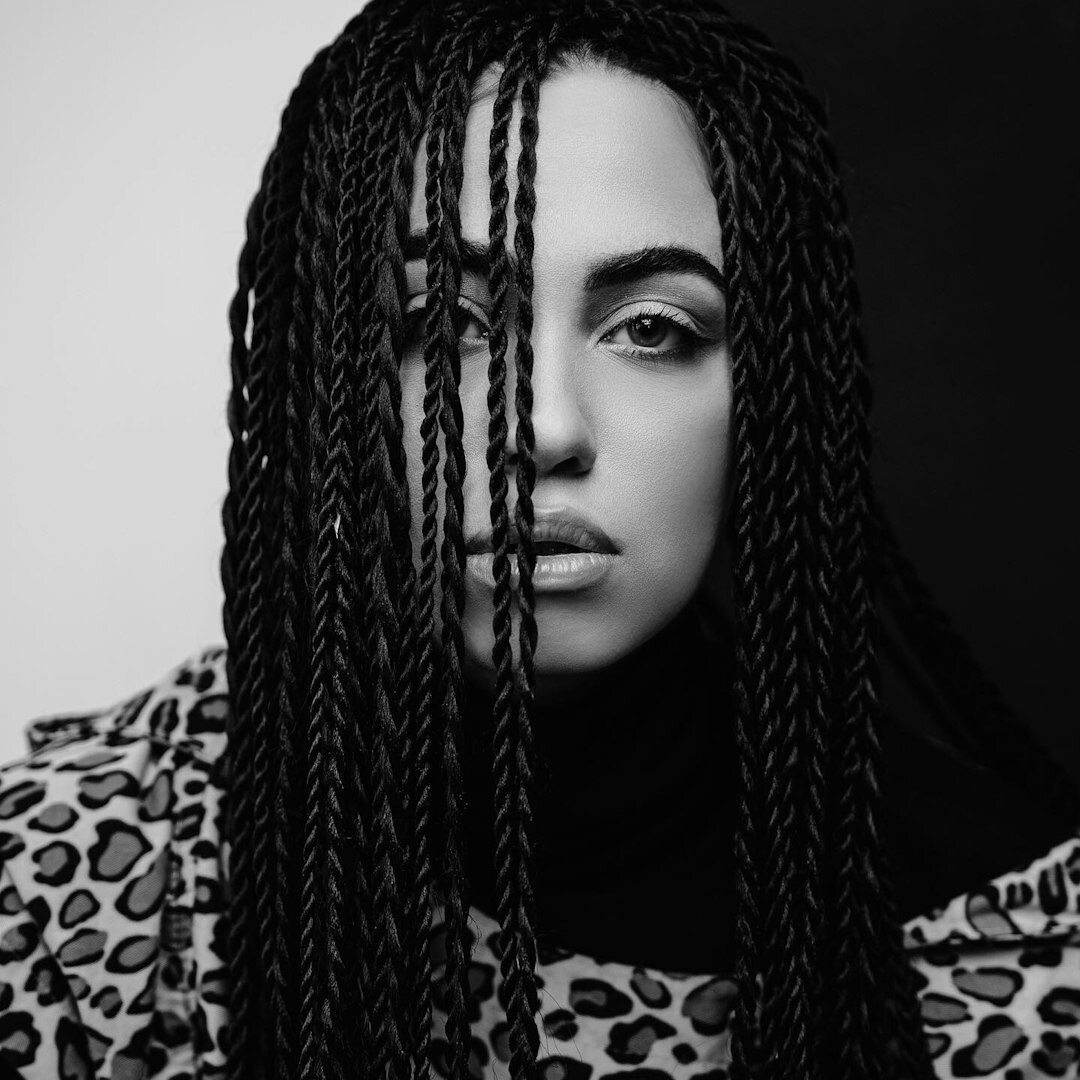 Studio portrait of an Afro-Brazilian woman in her 40s