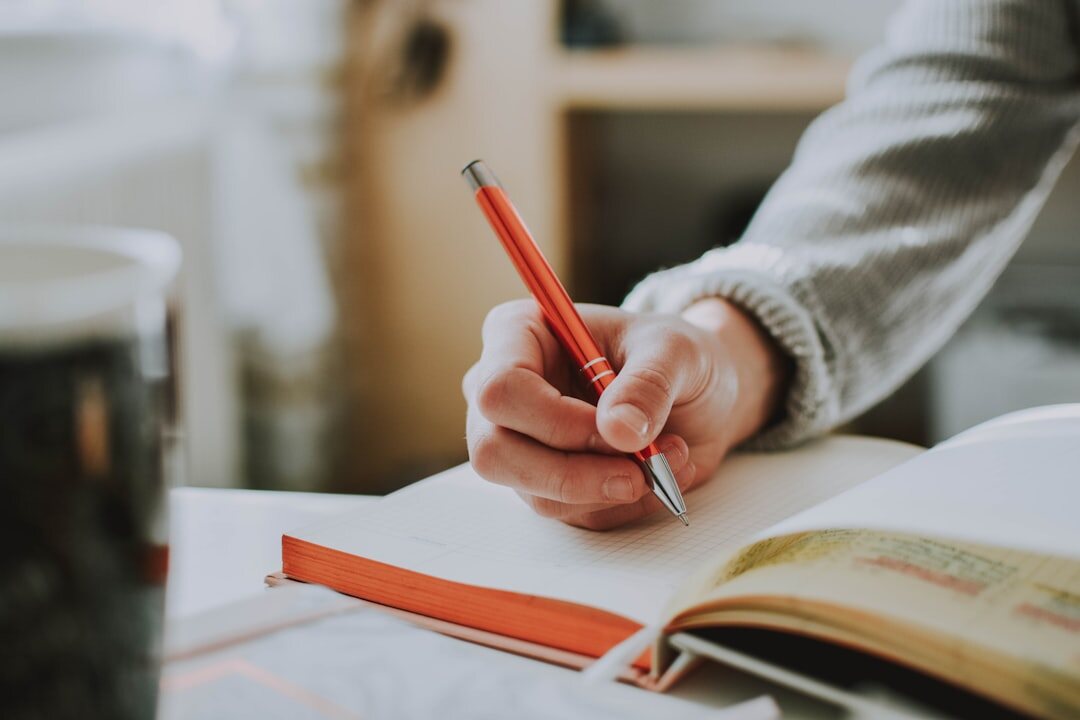 person journaling thoughts
