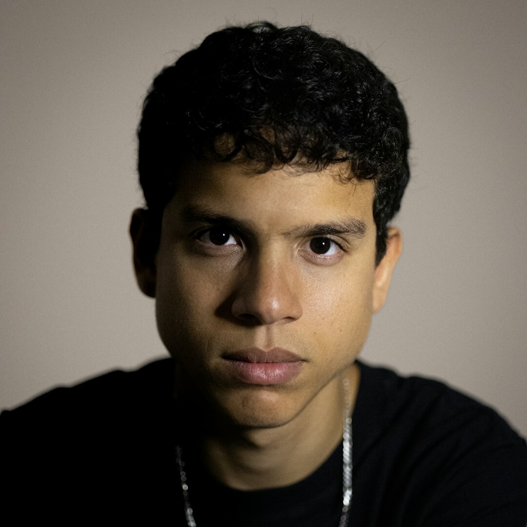 Studio portrait of a Pardo Brazilian man in his 20s